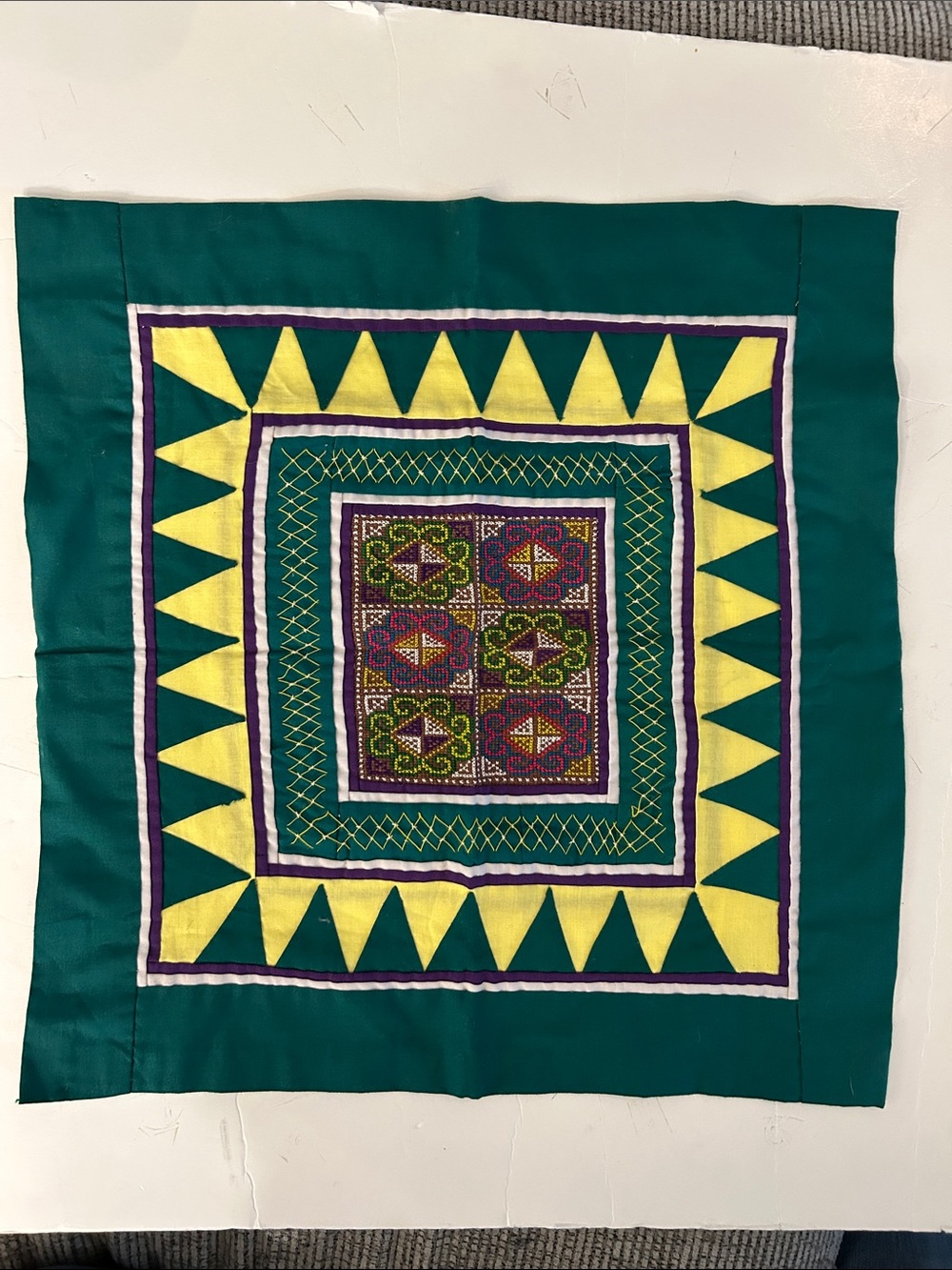 Embroidered Geometric Textile art Hmong known as paj ntaub Green yellow purple